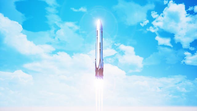 Eine Rakete startet in den blauen Himmel, umgeben von weißen Wolken. Die Rakete strahlt helles Licht aus ihrem Antrieb aus, während sie aufsteigt. Keine Menschen sind sichtbar. Das Bild vermittelt ein Gefühl von Fortschritt und Technologie.